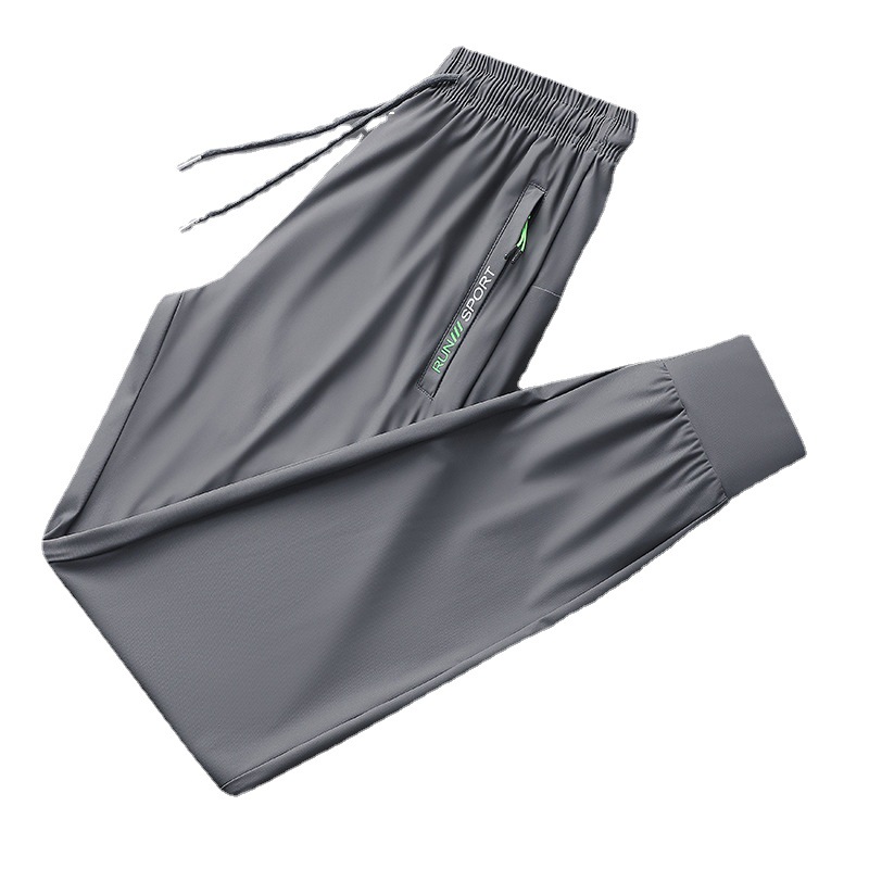 Pantalones deportivos casuales de seda de hielo para hombres pantalones de verano finos de punto de oro elásticos de secado rápido casuales atados al tobillo más pantalones de tamaño