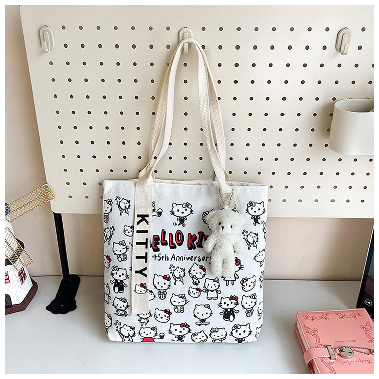 The new fashionable cartoon canvas bag, simple and versatile tote bag, cute commuting single-shoulder tote large bag, is selling well across borders undefined