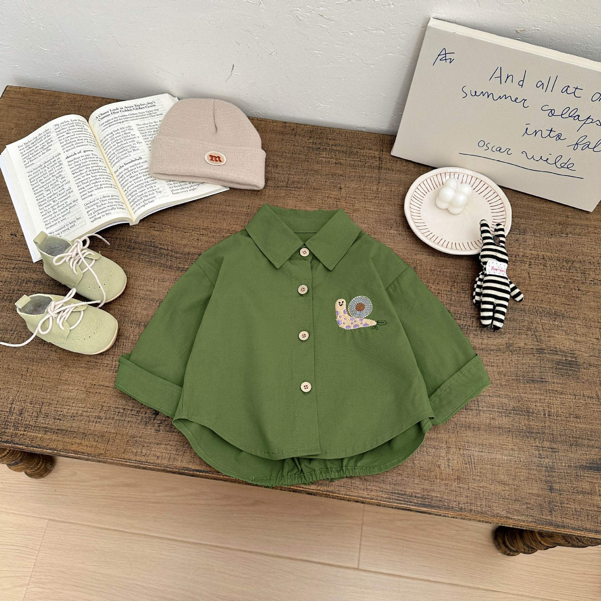 Ropa de bebé coreana 2026 nuevo bebé guapo camisa de algodón puro otoño impresión coreana de camisa de manga larga para niños