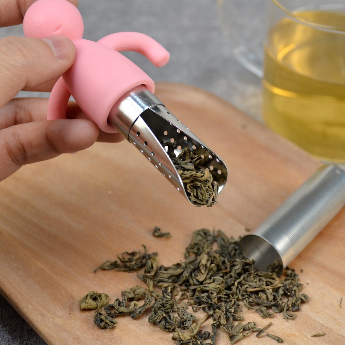 Colador de té creativo de acero inoxidable con cuchara de té colgando portátil de silicona en forma humana fabricante de té al por mayor lindo Filtro de té