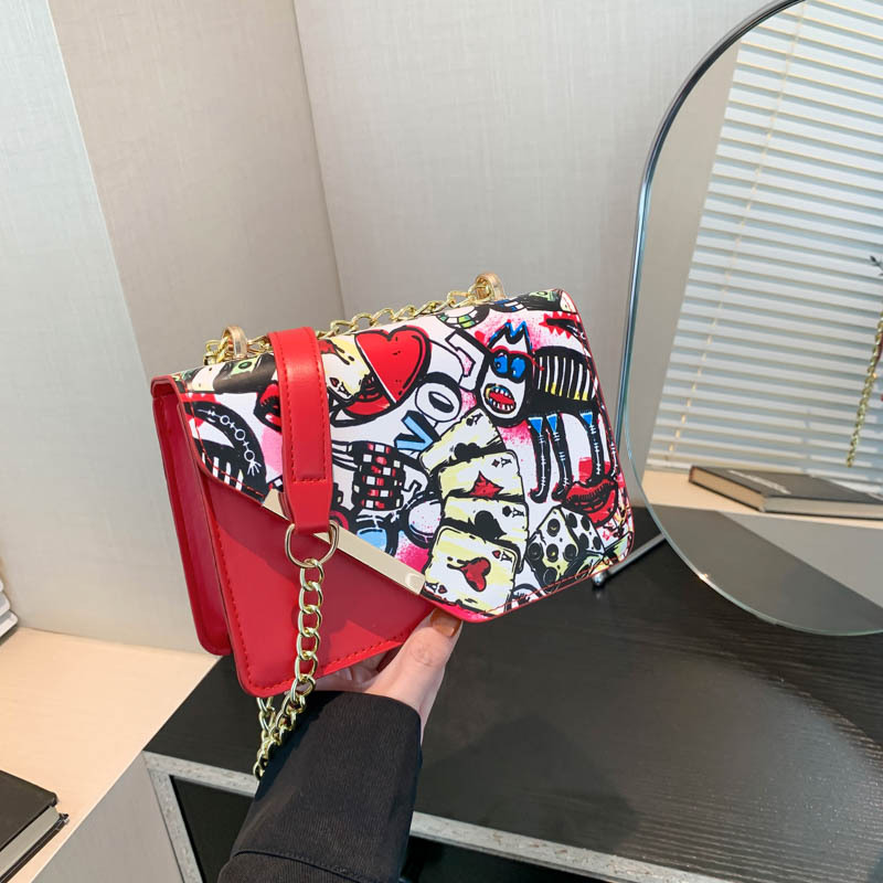 Moda personalidad graffiti impresión bolso de hombro 2024 nuevo nicho de diseño coreano cadena elegante bolso de hombro