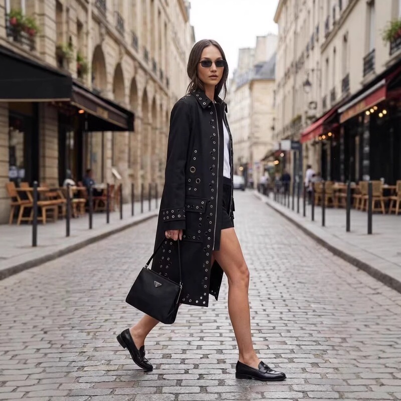 European and American Cross-Border Autumn New Heavy-Duty Metal Eyelet Rivet Long Trench Coat Black Lapel Coat Jacket European and American Cross-Border Autumn New Heavy-Duty Metal Eyelet Rivet Long Trench Coat Black Lapel Coat Jacket