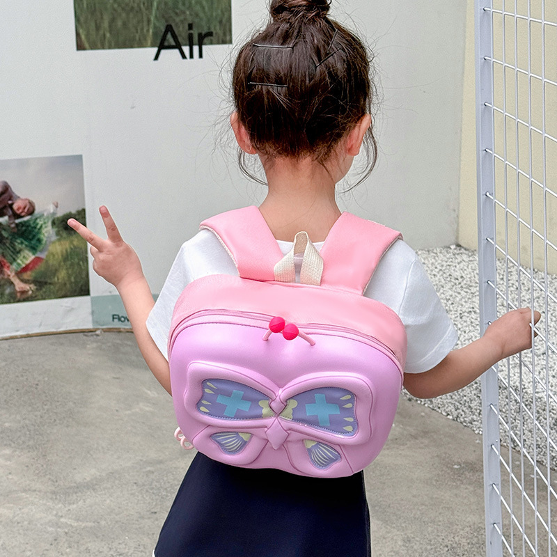 2025 nuevo arco de dibujos animados mochila de cáscara dura jardín de infantes para niños y niñas lindas mochila de cáscara de huevo de mariposa