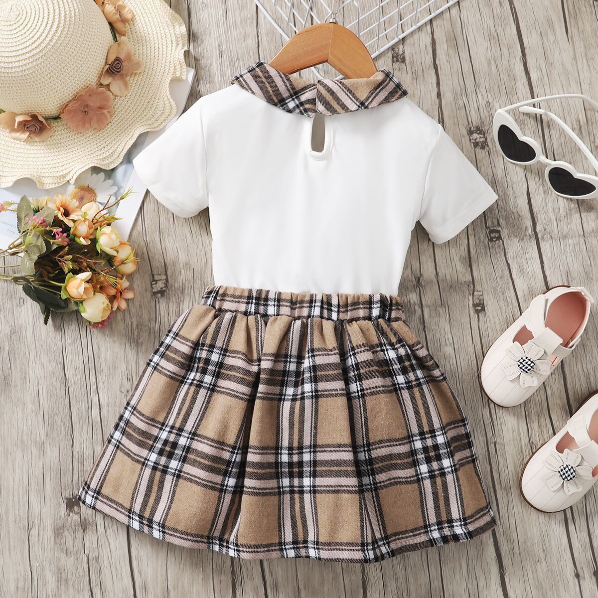 Las niñas de primavera y otoño 2023 nuevo estilo coreano oso popular impreso top de manga corta + falda a cuadros