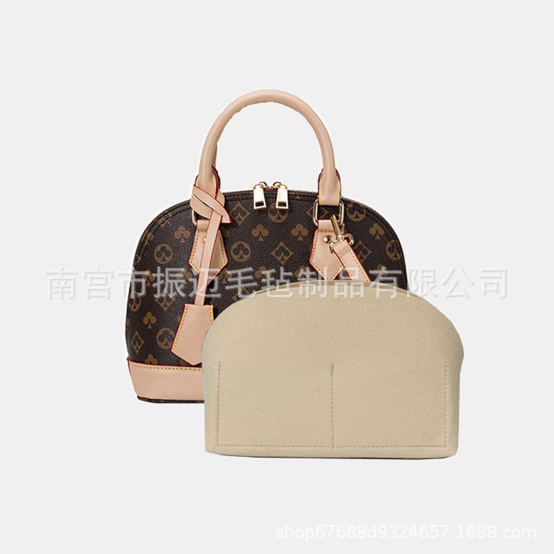 Suministro bolsa de forro de concha bolsa media bolsa de forro de acabado bolsa de soporte de fieltro bolsa de cosméticos de almacenamiento
