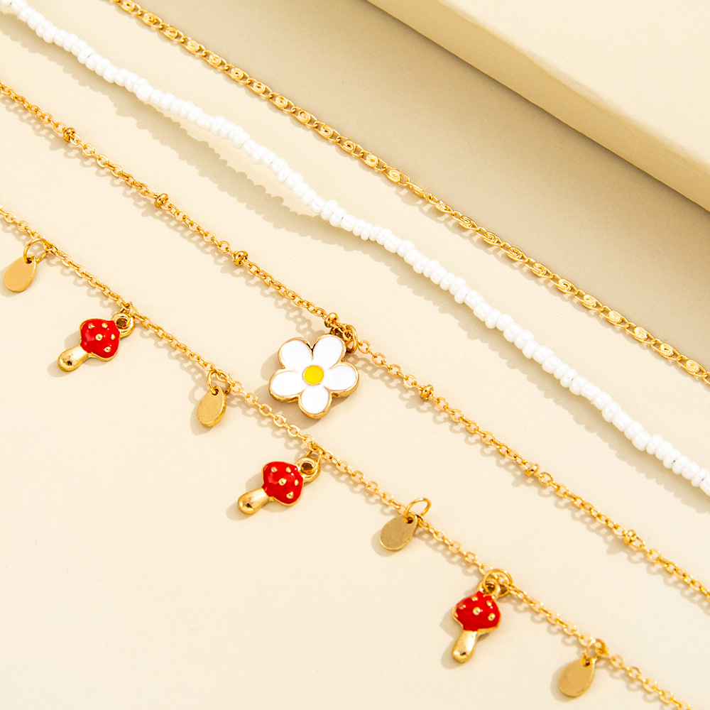 European and American new simple mushroom small pendant white flower pendant four-piece anklet
