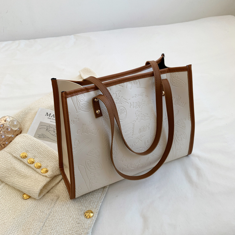 Bolsa de gran capacidad para mujeres otoño / invierno 2022 nueva moda de moda simple atmósfera bolsa de viaje de hombro japonesa bolsa especial