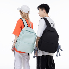 国境を越えたシンプルなランドセル卸売り純色新日系潮insカップルバックパック大容量中学生かばん