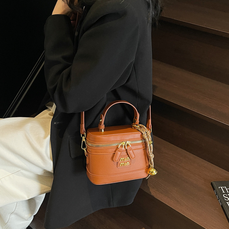 Caja portátil de alta gama transfronteriza pequeña bolsa cuadrada mujer 2025 nueva moda coreana bolso de mensajero de un solo hombro