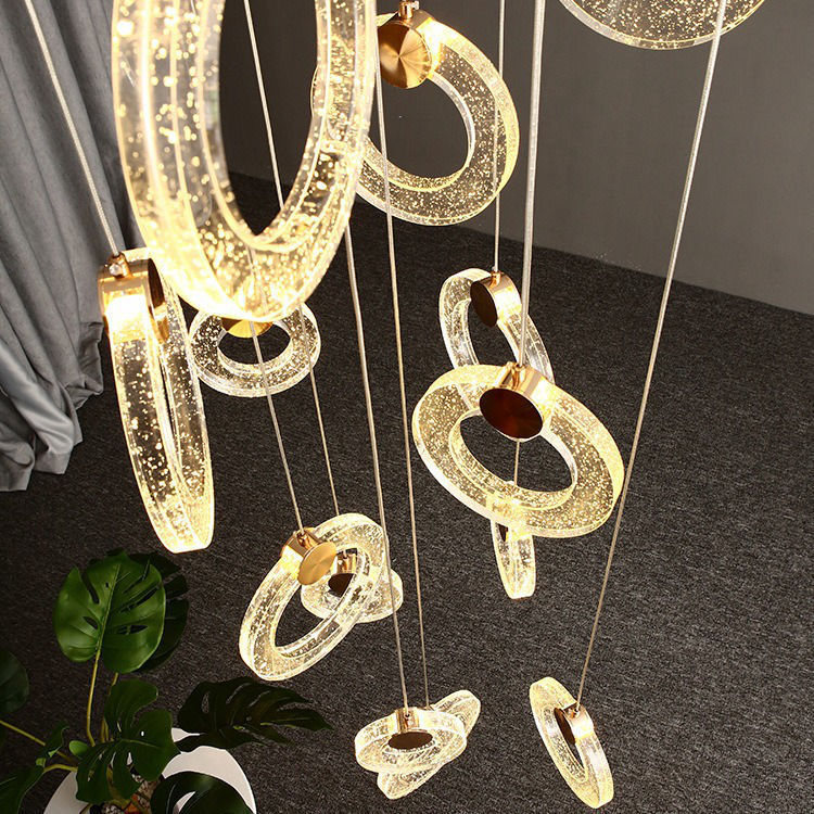 Decoración de escaleras giratorias modernas huecas posmodernas decoración de cristal de hotel sala de estar decoración de doble led