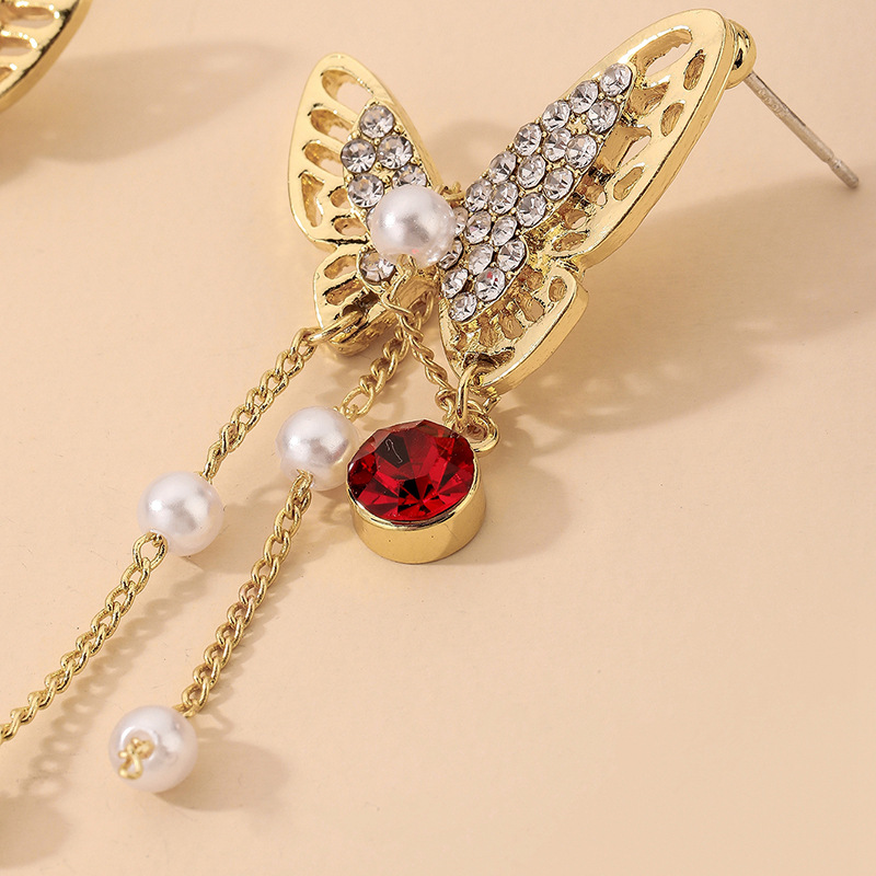 Nihaojewelry Jewelry Wholesale Retro Pearl Rhinestone Butterfly Tassel Earrings display picture 5