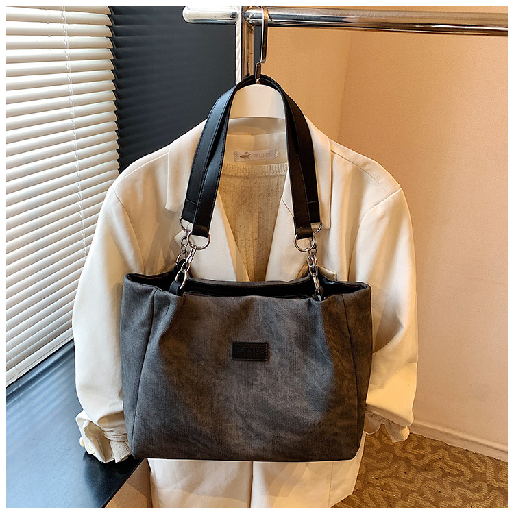 Korean style simple and versatile bag for women, new summer 2025 fashion and niche handbag, large capacity tote bag for commuting undefined