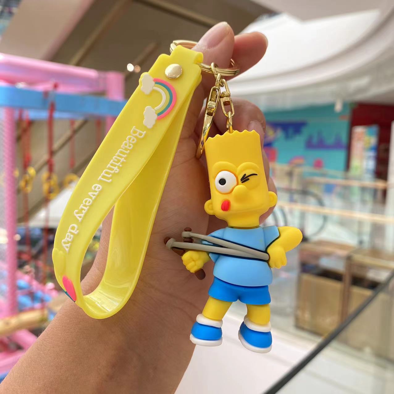 Cross-border Simpson llavero de dibujos animados muñeca pareja bolsa Coche colgante muñeca máquina muñeca pequeño regalo al por mayor
