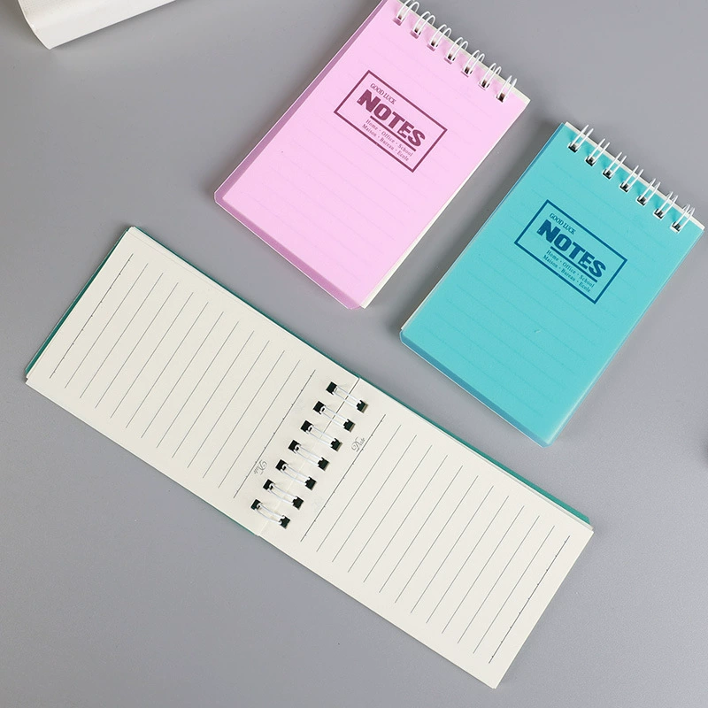 A7 spiral pocket notebook, handheld for elementary students, mixed pastel covers, wholesale 100‑pack