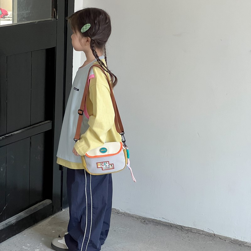 Moda coreana, bolsas de hombro para niños y niñas, exquisitas mini bolsas de cambio para bebés, bolsas de malla de comercio exterior nuevas para niños