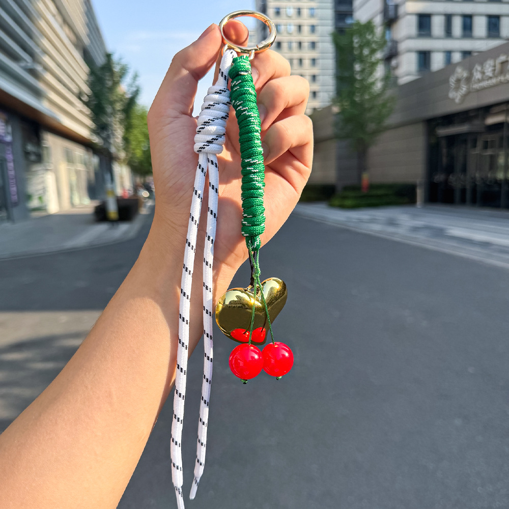 Nuevos productos transfronterizos creativos de letras de color cuerdas trenzadas llavero amor dibujos animados accesorios de diseño bolsos colgantes