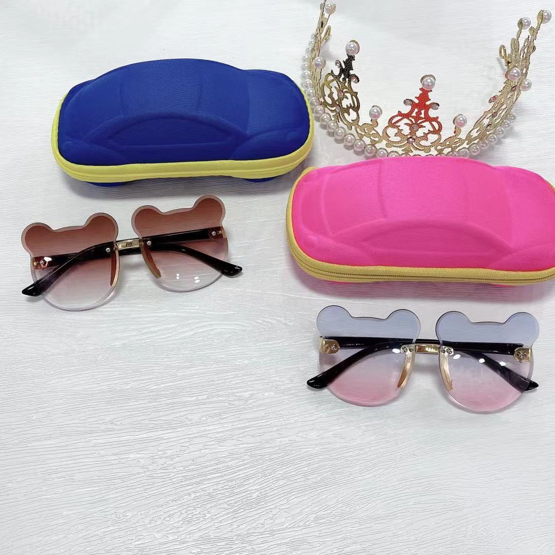 Nuevo oso gafas de sol de los niños raqueta de calle vanguardia moda calle raqueta copia pieza sin marco chica gafas de sol fábrica al por mayor