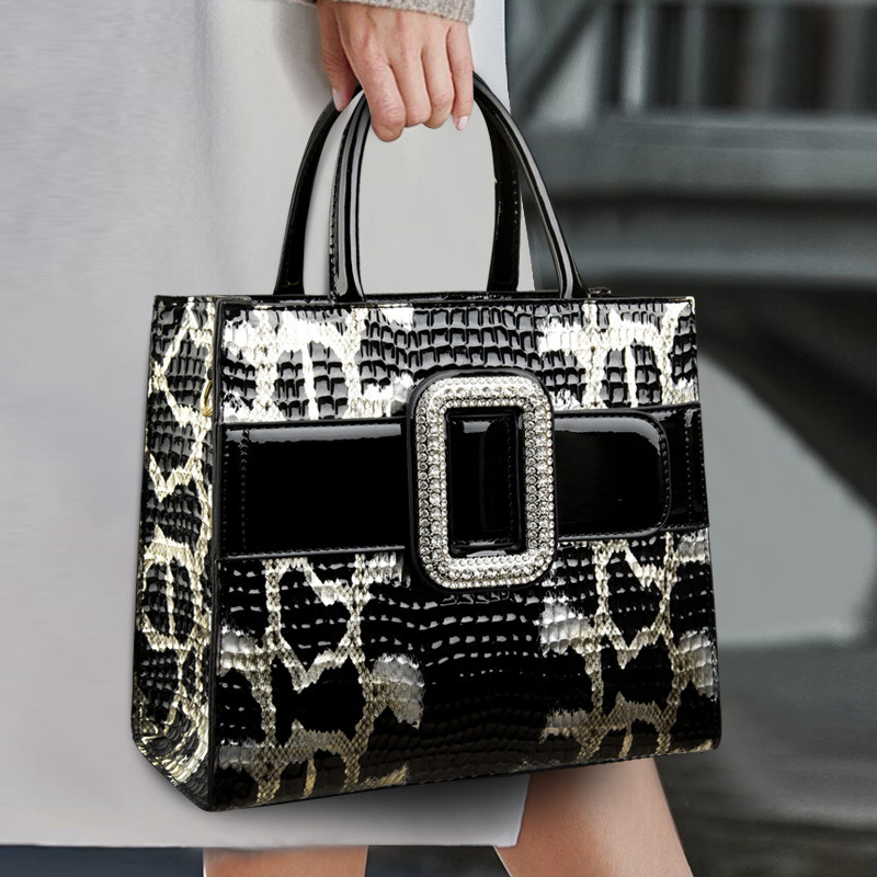 Nueva moda europea y americana todo-fósforo Luz de lujo en relieve patrón de piel de serpiente portátil hombro crossbody bolso de las mujeres