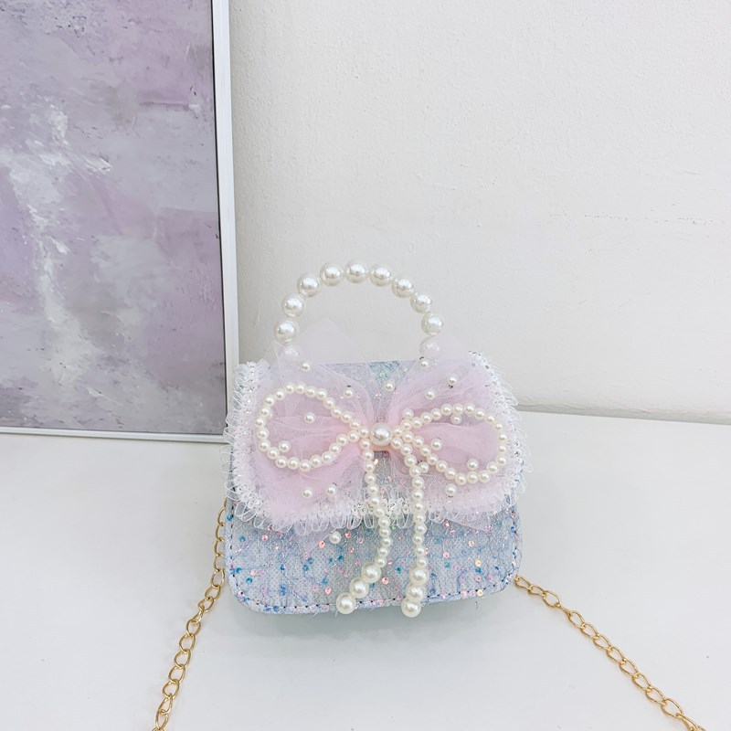 Accesorios para niños bolsos de moda de verano bolsos de mochila para chicas bolsos de mano princesa de perlas bolsos de cambio de viento fragante