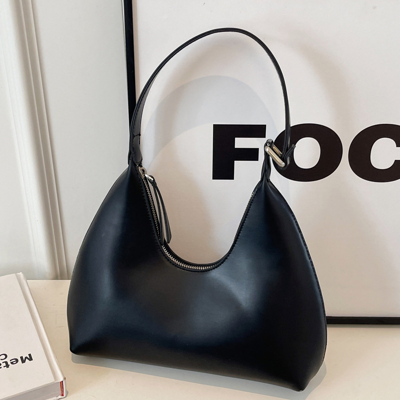 Axilas femininas 2024 novas em formato de crescente minimalista com temperamento versátil, viagens casuais, textura portátil,_voghion.com