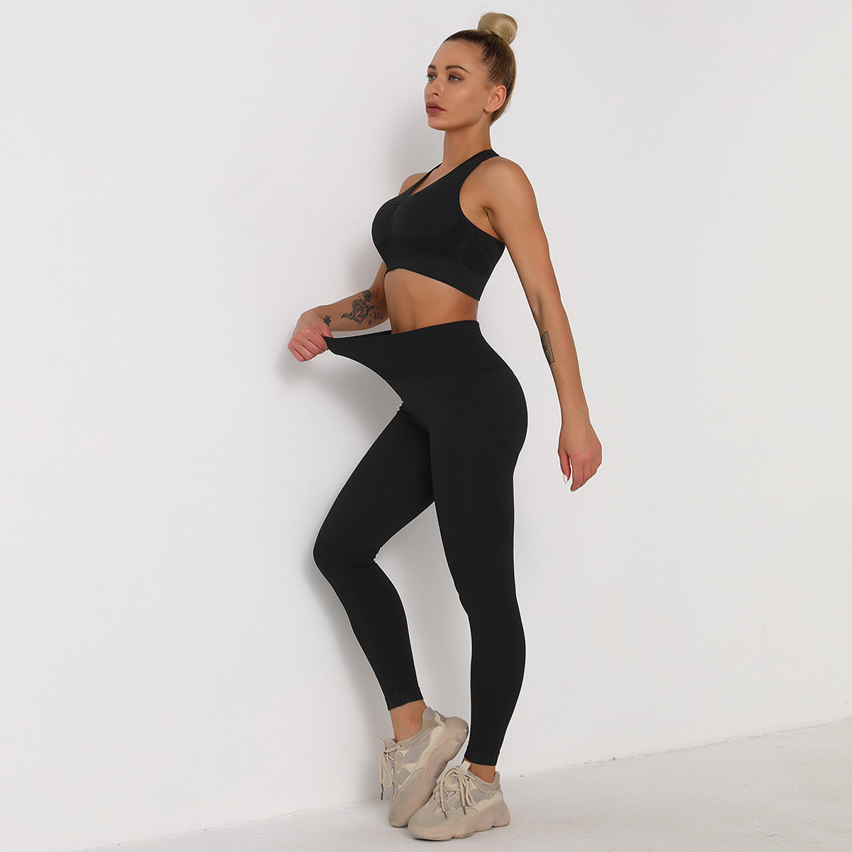 Conjunto de sujetador deportivo de sujeción ligera y legging de cintura ancha sin costuras NSLX48726