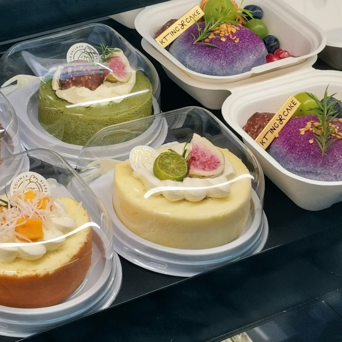 Rollo de torta caja de embalaje rollo suizo caja de embalaje con tenedor pequeña caja redonda transparente anti-niebla cubierta corte bloque punto occidental