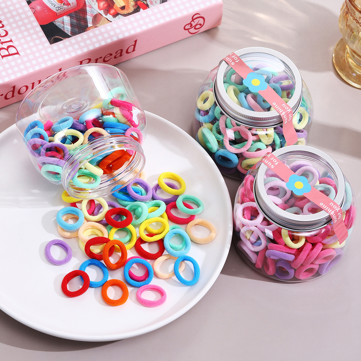 Los anillos para el cabello de los niños no dañan el cabello, los anillos de toalla para bebés, las chicas lindas, las bandas elásticas de los pulgares de color caramelo, los sombreros de cuerda para atar el cabello
