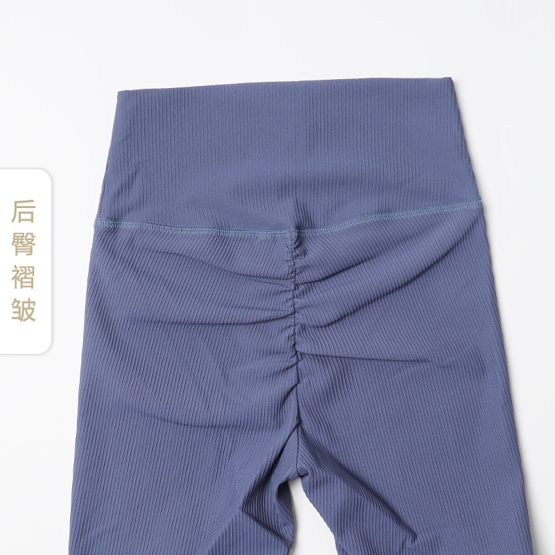 2022 nuevo acanalado sentimiento desnudo melocotón hip yoga pantalones femeninos de cintura alta Peach hip deportes fitness Leggings