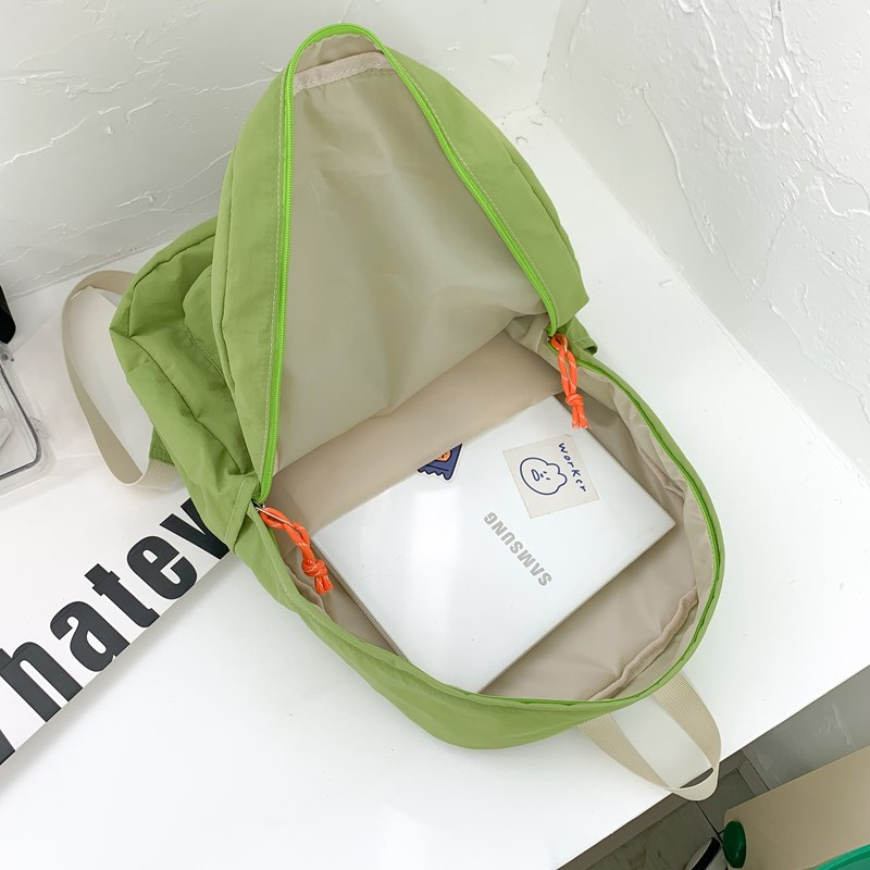 2024 otoño nuevo estilo ins versión coreana de la mochila de la escuela secundaria de gran capacidad estilo japonés contraste color sólido mochila doble al por mayor