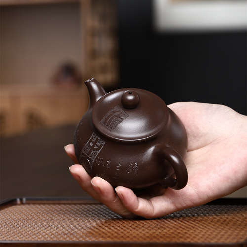 Wholesale Yixing all-pure handmade stone yellow purple sand pot ancient carved Pan pot easy to brew teapot Kung Fu tea set