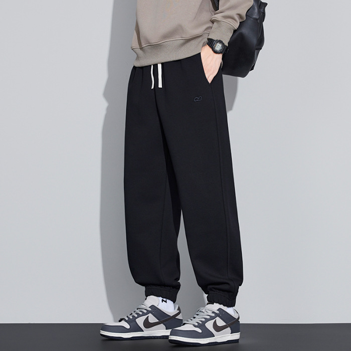 2025 nuevo estilo primavera y otoño suelto pie rectas bordado pantalones masculinos japoneses retro suelto pantalones de tendencia versátil