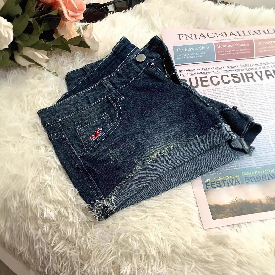 レトロなデザインのカールジーンズ女性のための夏のホットガールセクシーなローウエスト超ショートパンツタイトなヒップカバーホットパンツ