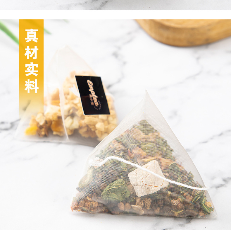 Triangle Tea Bag Sampler — Chrysanthemum, Cassia Seed, Apple Lotus & Sour Plum Herbal Blend in use