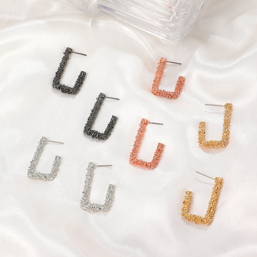 Creative Retro Geometric Personality Irregular Letter Carved Earrings display picture 3