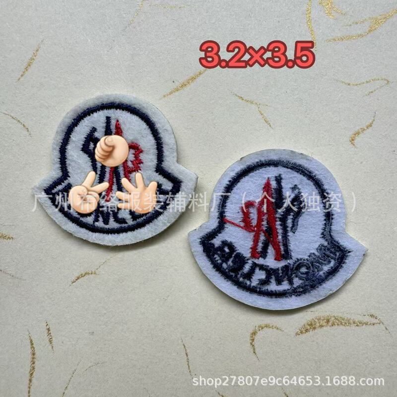 Moncler in-stock down jacket sleeve badge, embroidered label, fabric patch, hat label, shoe and sock label, jeans and children's clothing accessories Moncler in-stock down jacket sleeve badge, embroidered label, fabric patch, hat label, shoe and sock label, jeans and children's clothing accessories
