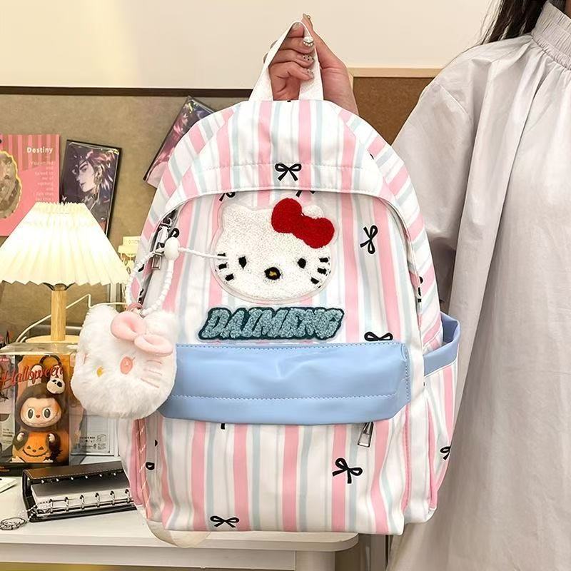 Limpieza banda de dibujos animados mochila de perros pequeños estudiantes frescos versátiles mochila de gran capacidad arco mochila de chicas