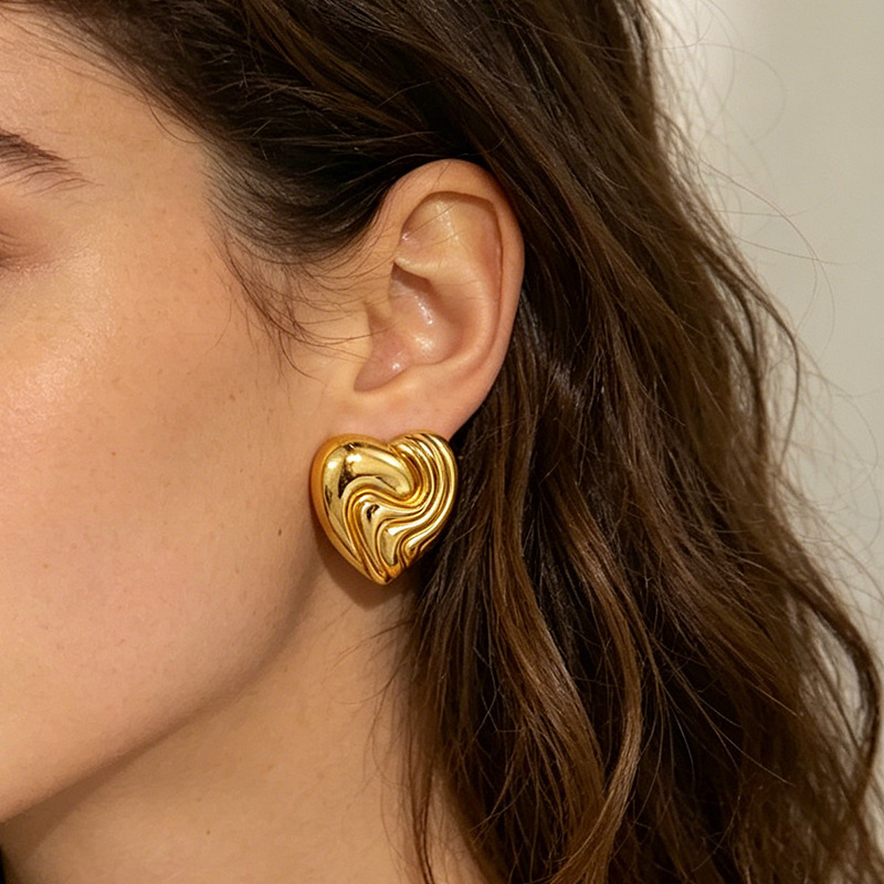 Europa y los Estados Unidos ins estilo nicho de moda personalidad joyas de acero inoxidable chapado en oro 18k textura pendientes de amor joyas joyas mujeres