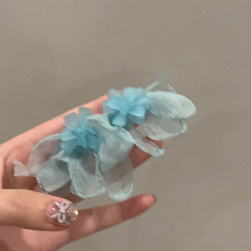 Pendientes de borla de flor de súper hada de plata Pendientes de ins pequeños frescos y dulces Personalidad de moda Pendientes de alta gama al por mayor