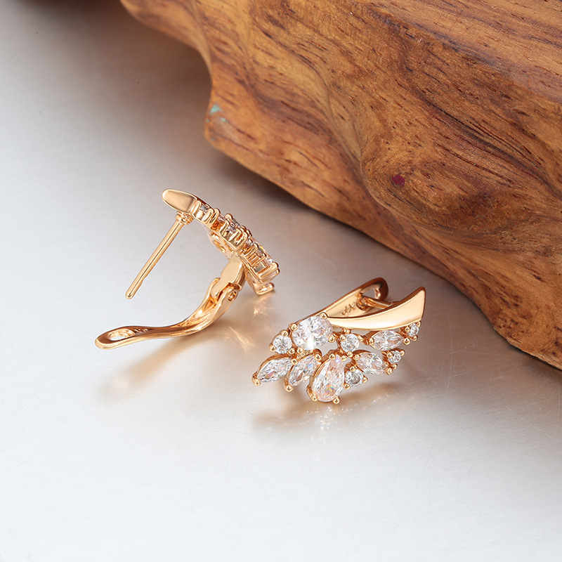 Xuping nicho ruso retró broche de auriculares de cobre chapado en 18k color europeo y americano pendientes transfronterizos personalizados al por mayor
