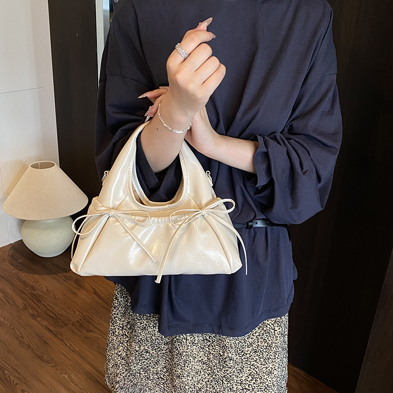 Bolso de moda coreano 2025 verano nuevo bolso femenino lindo lazo bolso de hombro casual letra bandolera