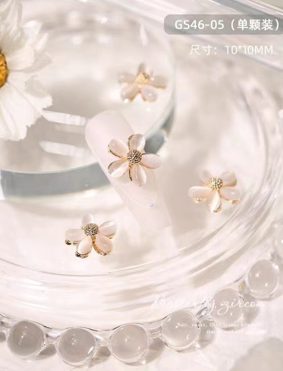 Accesorios de uñas Opal Mariposa nueva flor de lujo ligero Aleación de diamantes accesorios pegatinas de uñas decoración de diamantes de imitación al por mayor