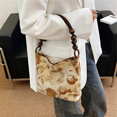 慵懶風包包原創焦糖瑪奇朵復古提花布藝單肩包春夏新款國風手提包
