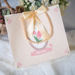 Wholesale small and fresh paper bags, clothing cute bow Christmas gift bags, Instagram packaging bags, hand-held