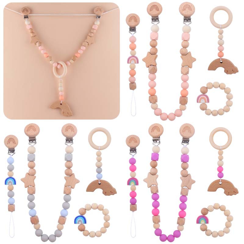 Nuevo bebé suministros dibujos animados silicona Arco Iris mordedor calmante bebé chupete cadena coche colgando mordedor conjunto de cuatro piezas