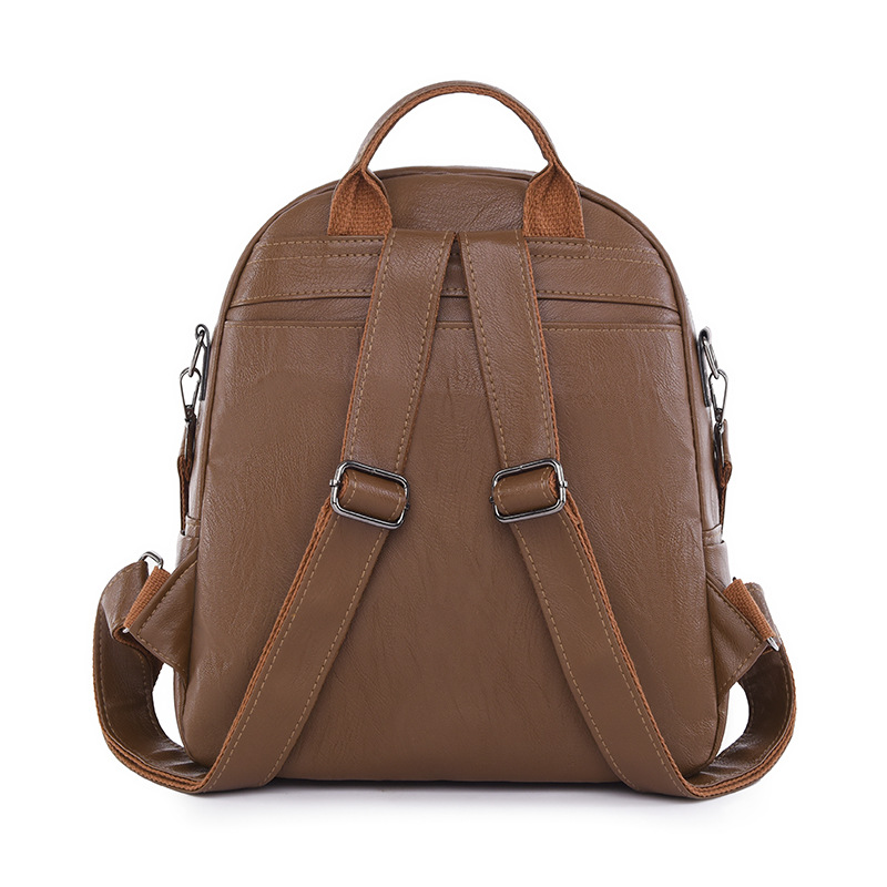 Nueva mochila de cuero suave para mujer casual del sudeste asiático moda remache retro mochila multifuncional de doble uso mochila escolar de moda