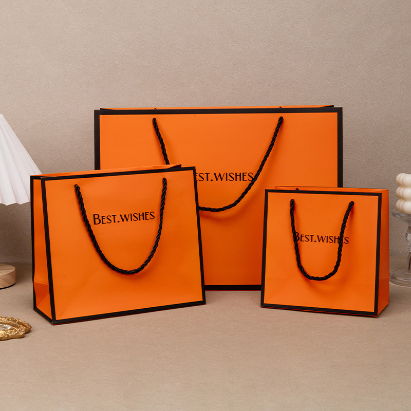 En stock naranja gran bolsa de regalo bolsa de embalaje cosmético ropa engrosada cartón blanco bolso de fábrica al por mayor