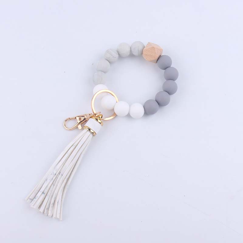 Pulsera de silicona pulsera llavero nuevo creativo DIY borla colgante contraste color