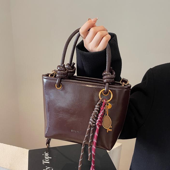 Alta sensación retro bolso para mujeres 2024 nuevo estilo versátil tendencia bolso de hombro bolso explosivo bolso de cubo portátil