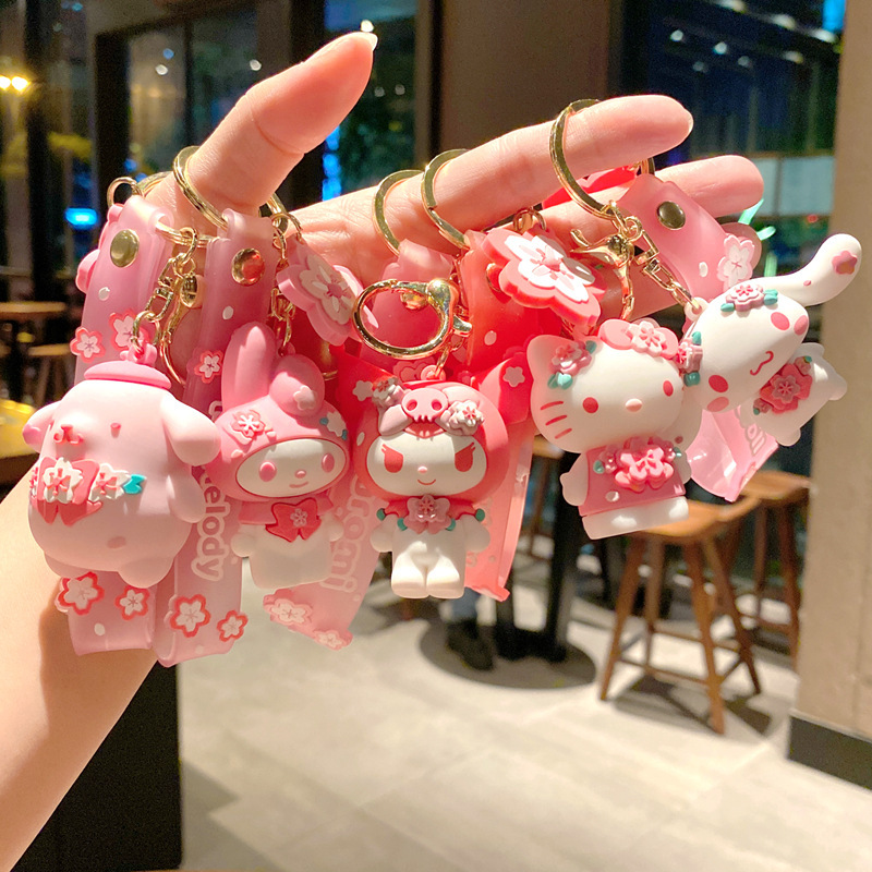ピンクの桜のサンリオの公仔の玉桂の犬のキーホルダーはかわいい漫画のペンダントの自動車のキーホルダーの卸売りを掛けます。|undefined