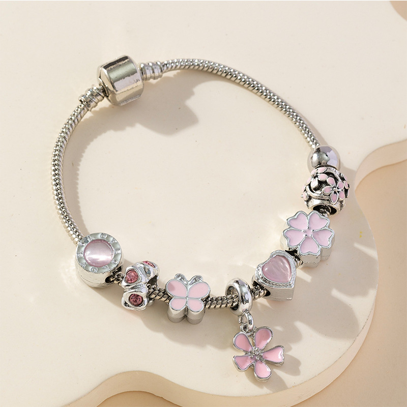 Panjia pulsera Dora DIY cuentas explosivas transfronterizas colgante pétalos de goteo de aceite ajustable flor amor pulsera de cobre